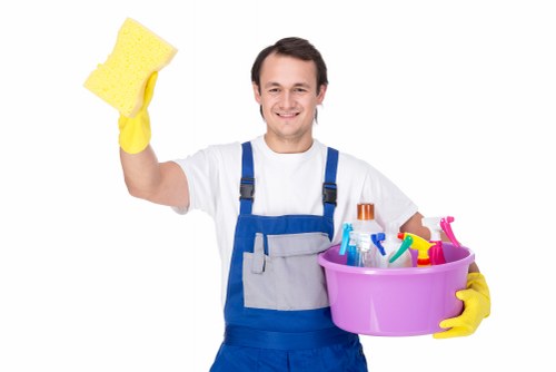 Technician maintaining safe hygiene during carpet cleaning