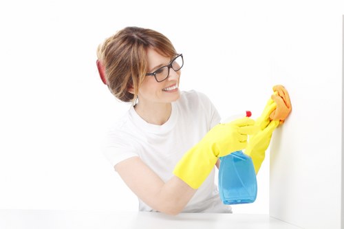 Technician inspecting a cleaned carpet after a concern